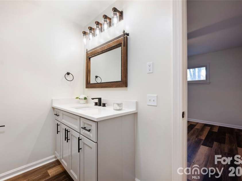 203 Ewing Drive, Belmont, NC 28012.  MLS# CAR4393332, YatesRealty ID 11790. En suite bath