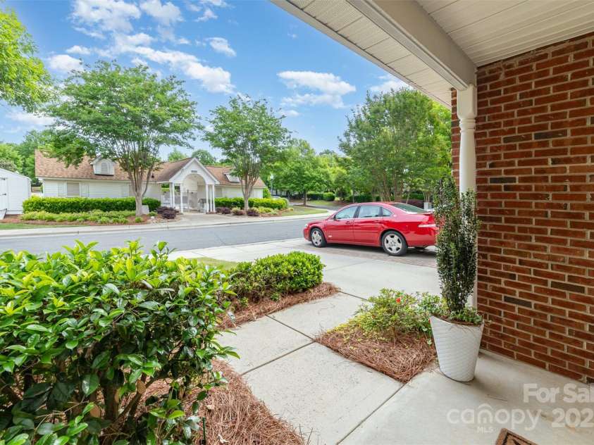 10617 Fuller Ridge Circle, Charlotte, NC 28270.  MLS# CAR4255887, YatesRealty ID 11793. Front porch