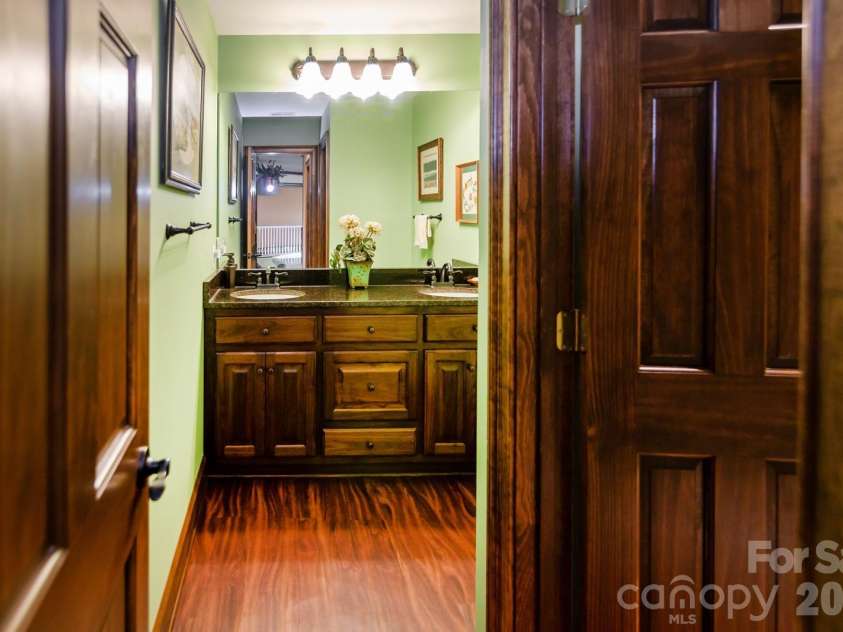 1720 Mills Harris Road, Wingate, NC 28174.  MLS# CAR4366223, YatesRealty ID 11793. Upstairs Bath