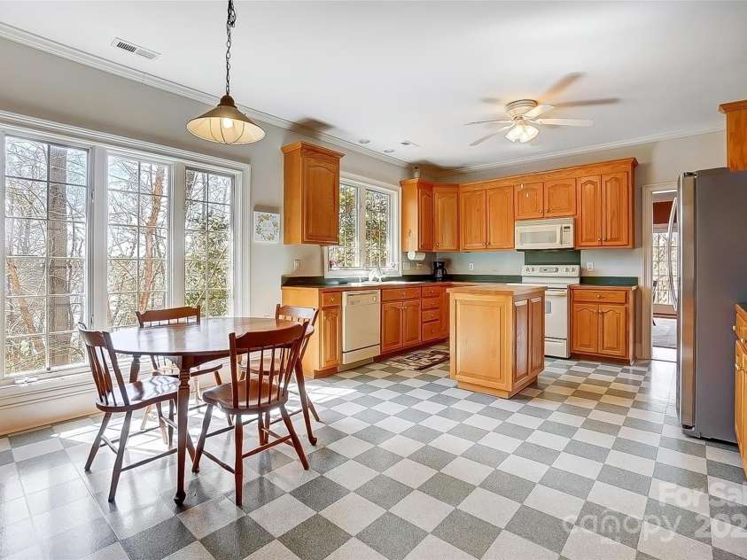4633 River Bluff Court, Charlotte, NC 28214.  MLS# CAR4235344, YatesRealty ID 11796. Enjoy dining in your kitchen with the lake view as your backdrop