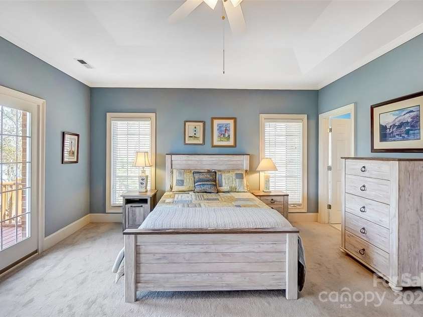 4633 River Bluff Court, Charlotte, NC 28214.  MLS# CAR4235344, YatesRealty ID 11796. Lake facing primary suite with walk-in closet