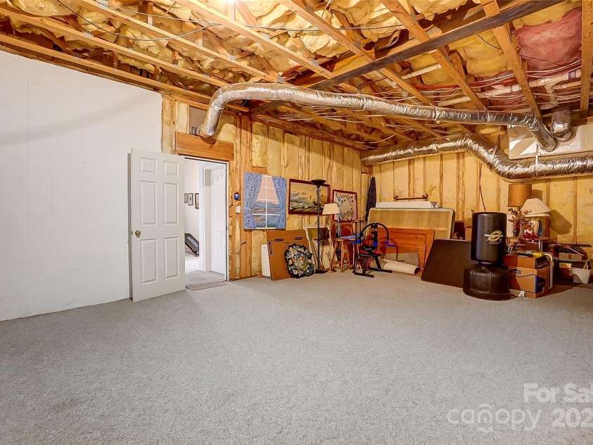 4633 River Bluff Court, Charlotte, NC 28214.  MLS# CAR4235344, YatesRealty ID 11796. Large unfinished storage awaiting your finishing touches