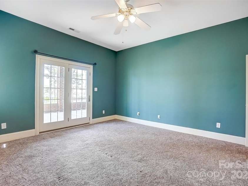 4633 River Bluff Court, Charlotte, NC 28214.  MLS# CAR4235344, YatesRealty ID 11796. Secondary bedroom with access to outdoor living area