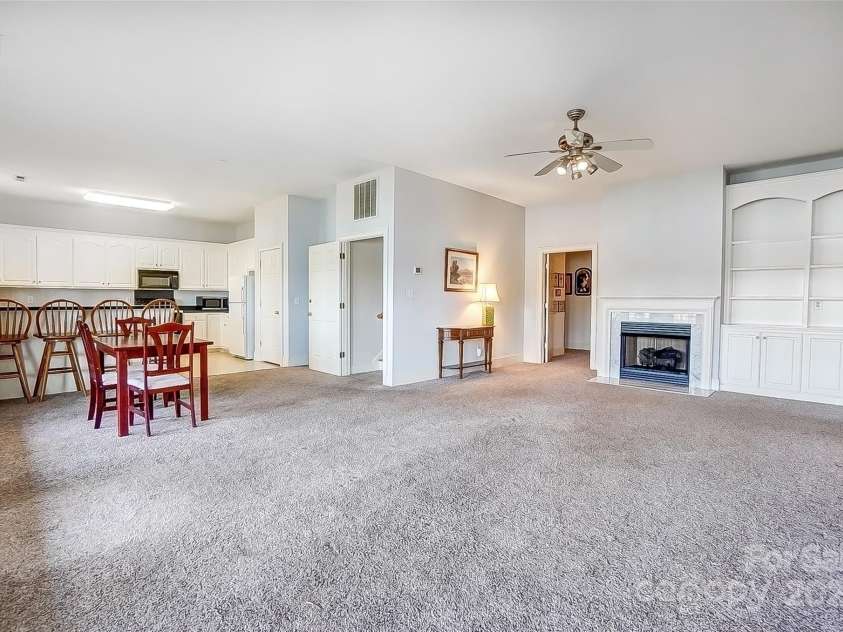 4633 River Bluff Court, Charlotte, NC 28214.  MLS# CAR4235344, YatesRealty ID 11796. The lower level is an entertainer's paradise, w/ large rec room featuring a fireplace & built-ins, 2nd  kitchen, 2 BRs, flex room, & ample unfinished storage spaces