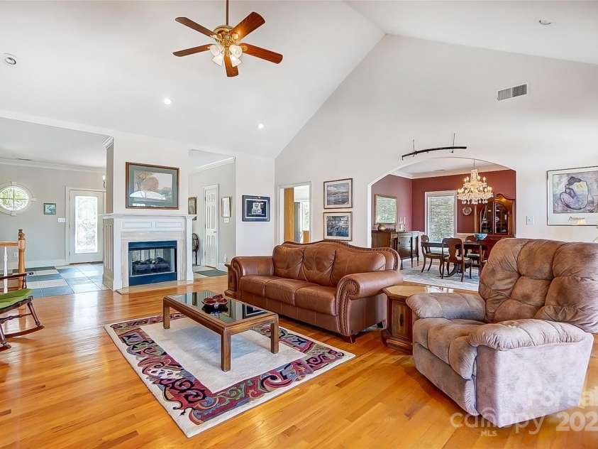4633 River Bluff Court, Charlotte, NC 28214.  MLS# CAR4235344, YatesRealty ID 11796. Vaulted Great room with fireplace flows to formal dining