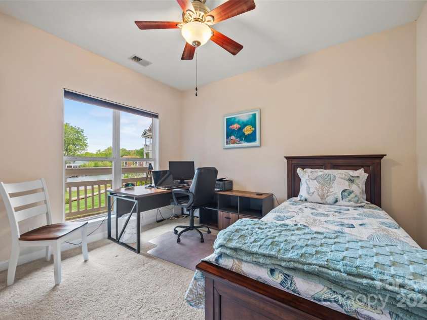 7822 Village Harbor Drive, Cornelius, NC 28031.  MLS# CAR4245678, YatesRealty ID 11798. Bedroom 3