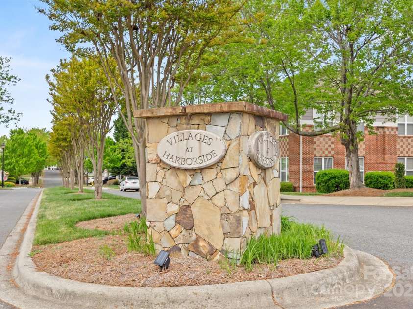 7822 Village Harbor Drive, Cornelius, NC 28031.  MLS# CAR4245678, YatesRealty ID 11798. Community Entrance
