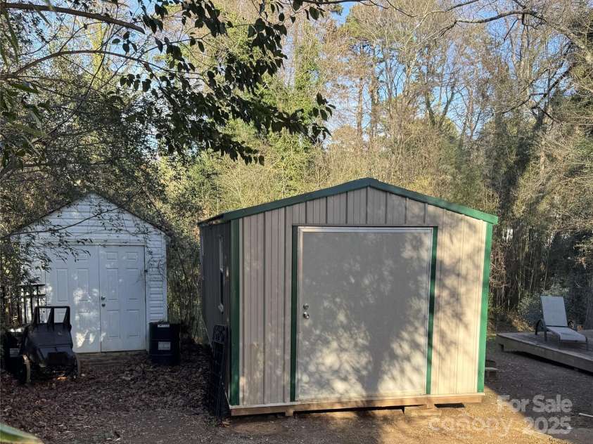 21233 Cornelius Street, Cornelius, NC 28031.  MLS# CAR4329349, YatesRealty ID 1180. Two storage Buildings