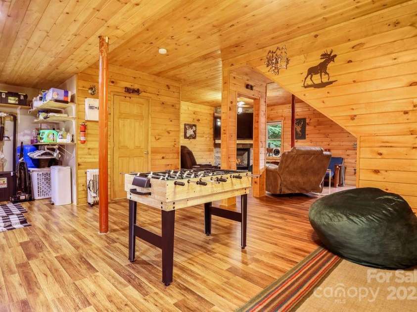 4271 Old Field Creek Road, Grassy Creek, NC 28631.  MLS# CAR4284275, YatesRealty ID 1180. Basement with Fireplace 