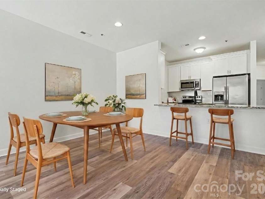 104 Pier 33 Drive, Mooresville, NC 28117.  MLS# CAR4378034, YatesRealty ID 11800. Dining Staged.