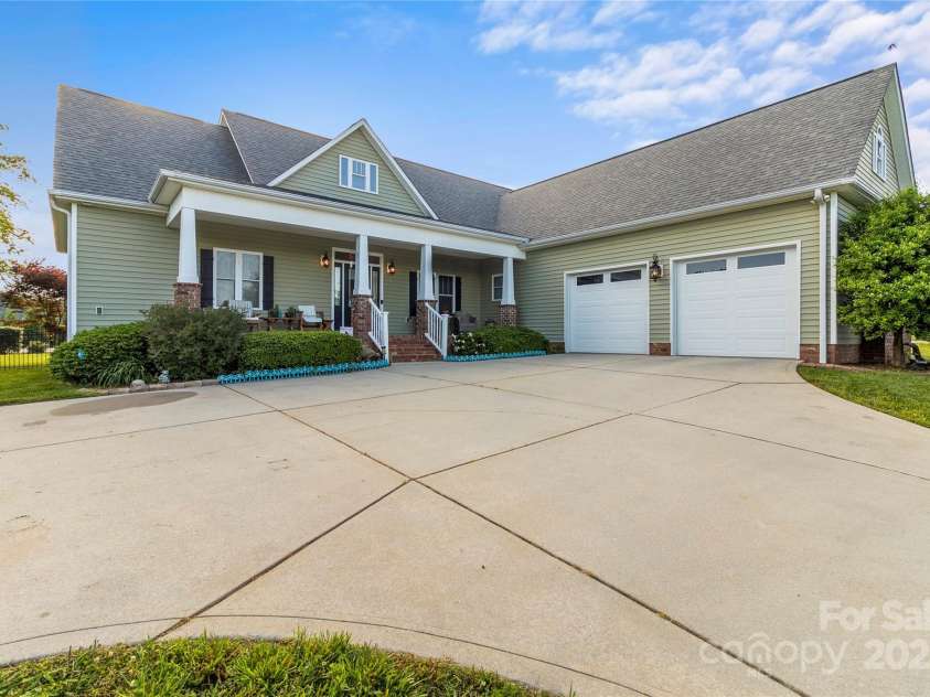 557 Luther Drive, Iron Station, NC 28080.  MLS# CAR4246000, YatesRealty ID 11801. 