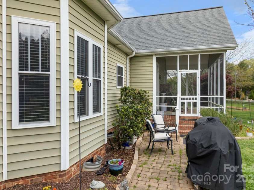 557 Luther Drive, Iron Station, NC 28080.  MLS# CAR4246000, YatesRealty ID 11801. Back of House/Grilling area