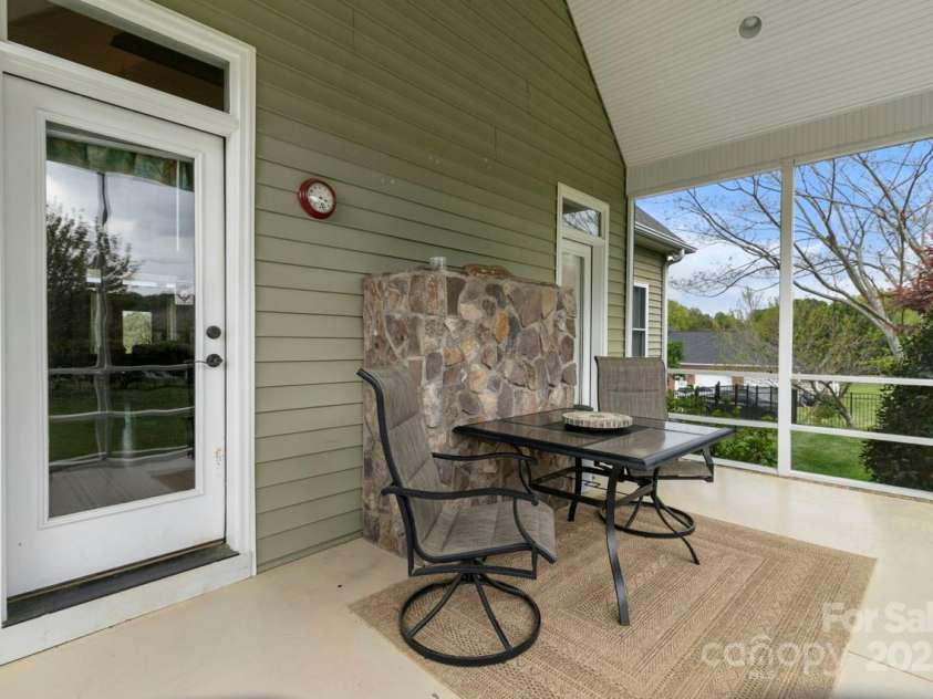 557 Luther Drive, Iron Station, NC 28080.  MLS# CAR4246000, YatesRealty ID 11801. Memories with family and friends will be made on the large screen porch