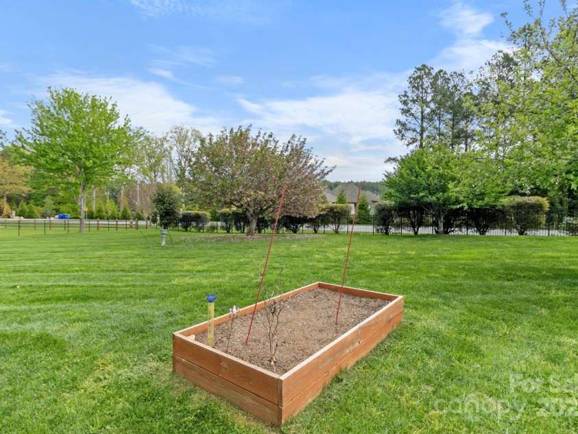 557 Luther Drive, Iron Station, NC 28080.  MLS# CAR4246000, YatesRealty ID 11801. Raised Bed