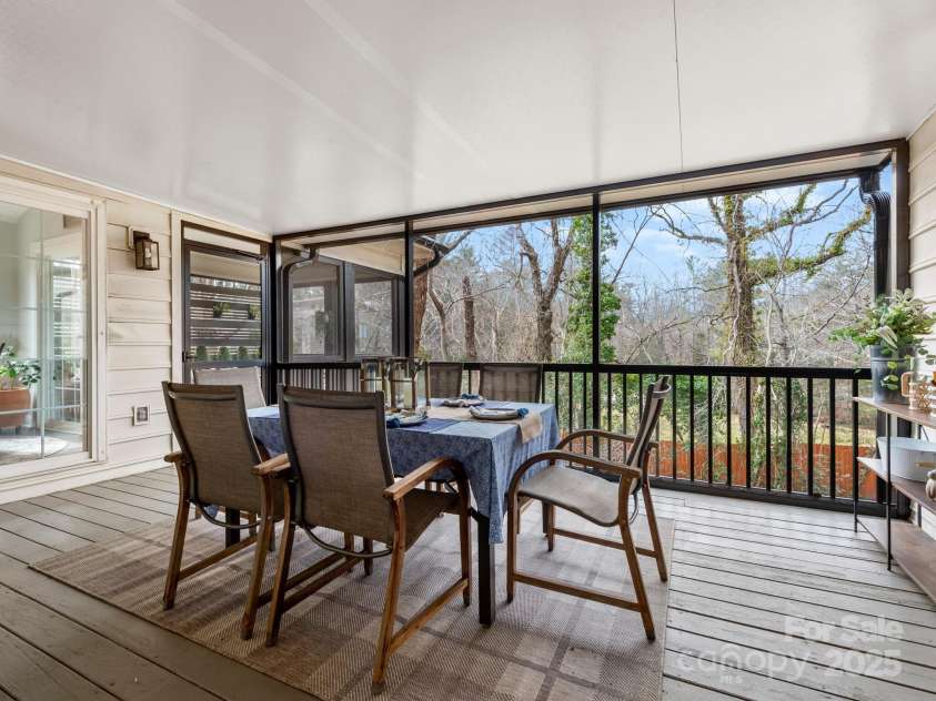 170 Weston Road, Arden, NC 28704.  MLS# CAR4222596, YatesRealty ID 11805. Fully screened back porch