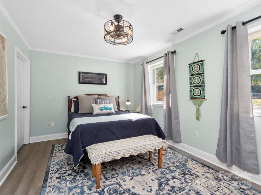 170 Weston Road, Arden, NC 28704.  MLS# CAR4222596, YatesRealty ID 11805. Lower level bedroom with walk-in closet