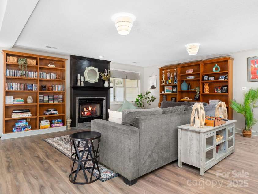 170 Weston Road, Arden, NC 28704.  MLS# CAR4222596, YatesRealty ID 11805. Lower level gathering space