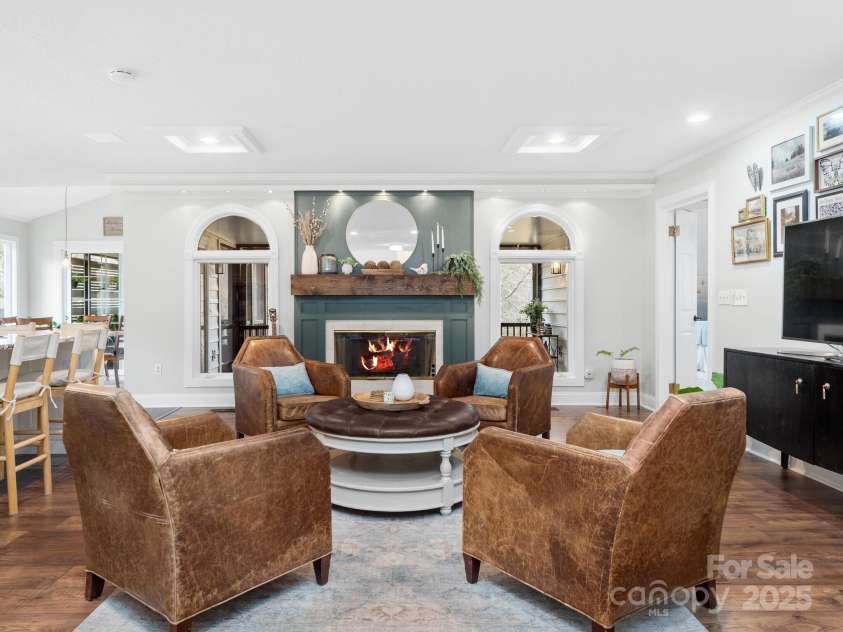 170 Weston Road, Arden, NC 28704.  MLS# CAR4222596, YatesRealty ID 11805. Sitting area with gas fireplace