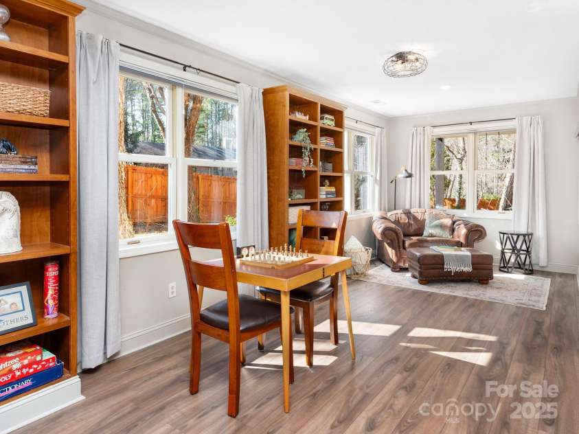 170 Weston Road, Arden, NC 28704.  MLS# CAR4222596, YatesRealty ID 11805. Tons of built-in bookshelves in the lower level