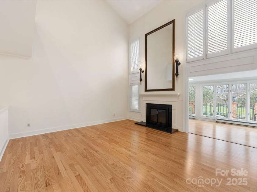 2027 Meadowood Lane, Charlotte, NC 28211.  MLS# CAR4224045, YatesRealty ID 11807. Great Room opens to Large Sunroom.