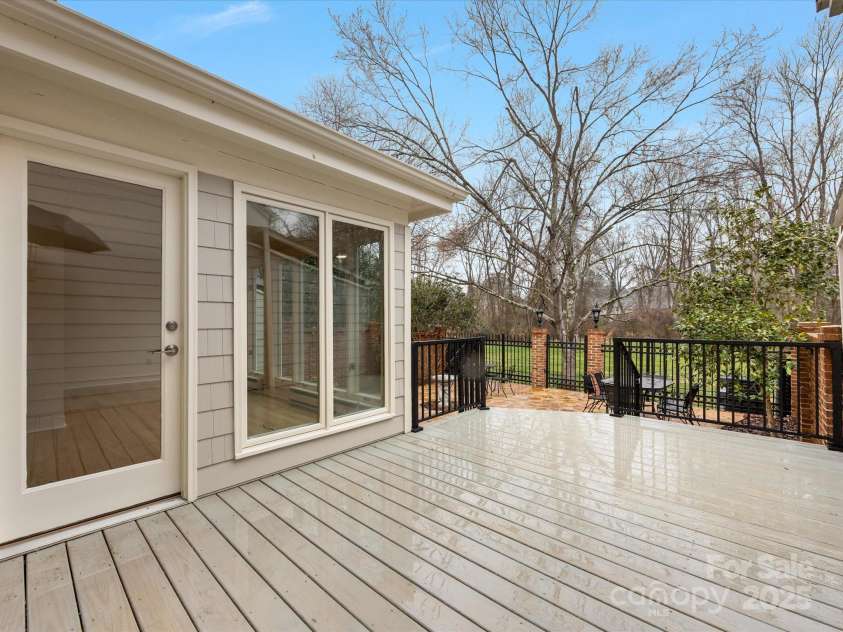 2027 Meadowood Lane, Charlotte, NC 28211.  MLS# CAR4224045, YatesRealty ID 11807. New Decking opens to Sunroom