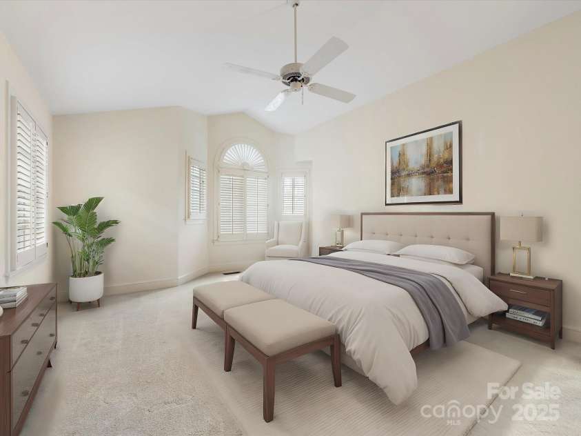 2027 Meadowood Lane, Charlotte, NC 28211.  MLS# CAR4224045, YatesRealty ID 11807. Nice oversized Primary Bedroom with plenty of space for furniture and vaulted ceiling.  Plantation Shutters. Virtually Staged.