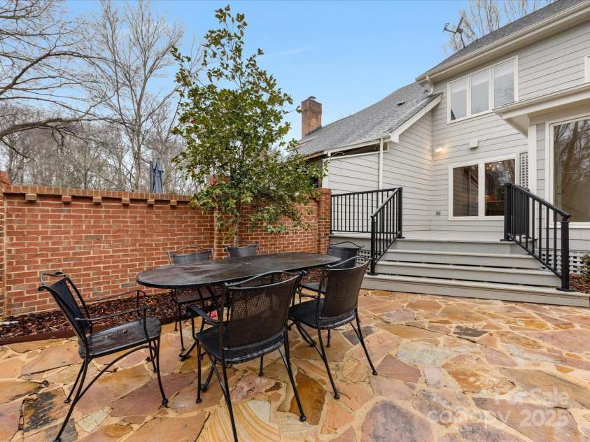 2027 Meadowood Lane, Charlotte, NC 28211.  MLS# CAR4224045, YatesRealty ID 11807. Stone Patio opens to a New Deck