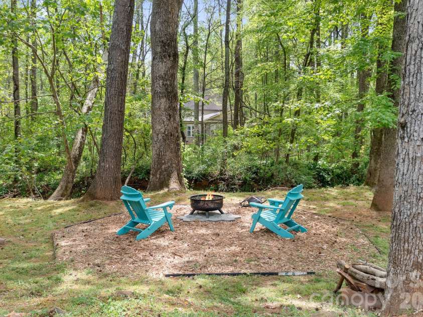 5617 Sugarcane Court, Mint Hill, NC 28227.  MLS# CAR4366997, YatesRealty ID 11809. Enjoy the night by the fire pit
