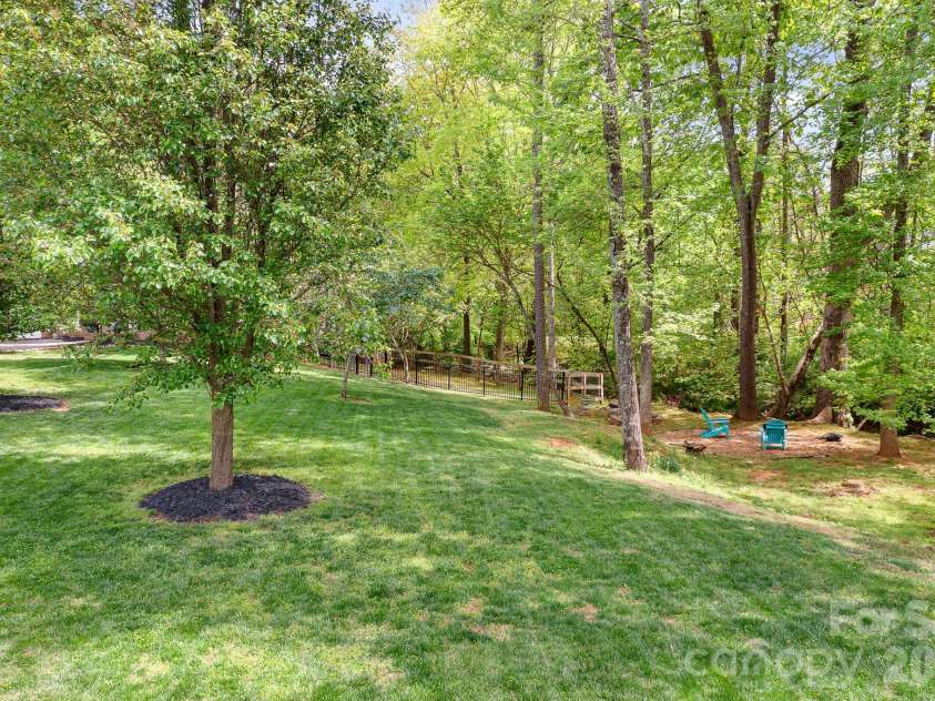 5617 Sugarcane Court, Mint Hill, NC 28227.  MLS# CAR4366997, YatesRealty ID 11809. Large side yard