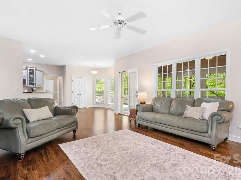 5617 Sugarcane Court, Mint Hill, NC 28227.  MLS# CAR4366997, YatesRealty ID 11809. Open floorplan - living room looking to the kitchen