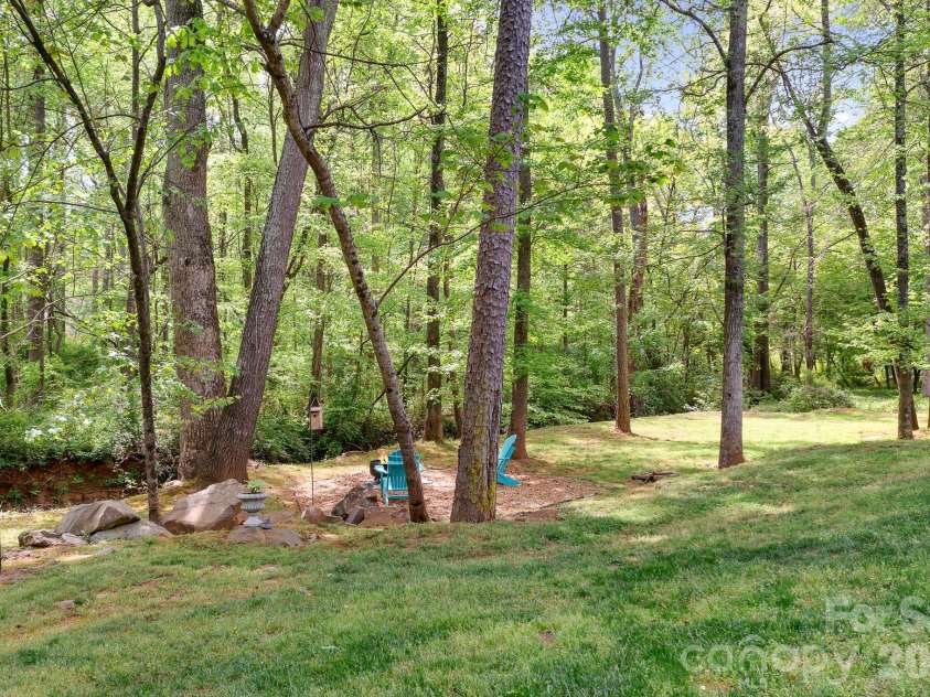 5617 Sugarcane Court, Mint Hill, NC 28227.  MLS# CAR4366997, YatesRealty ID 11809. Owners have added a wonderful firepit area.