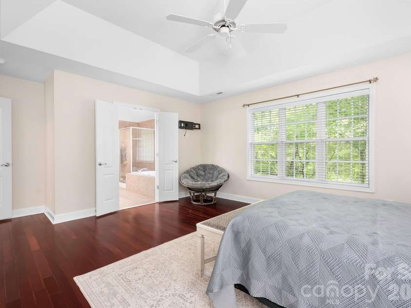5617 Sugarcane Court, Mint Hill, NC 28227.  MLS# CAR4366997, YatesRealty ID 11809. Primary bedroom