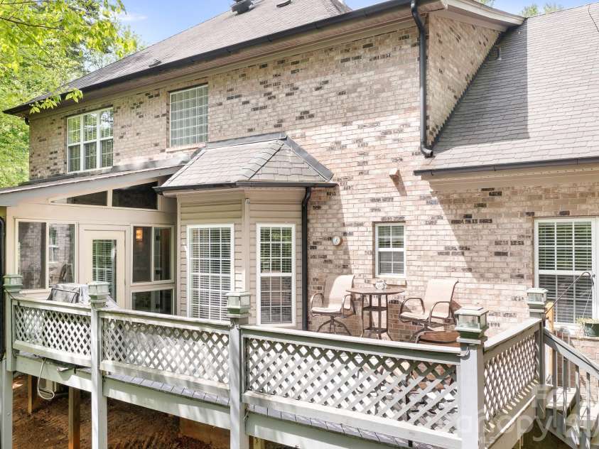 5617 Sugarcane Court, Mint Hill, NC 28227.  MLS# CAR4366997, YatesRealty ID 11809. Sunroom and deck
