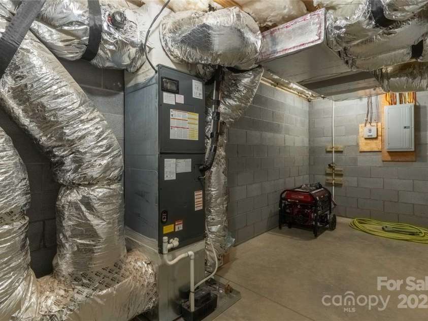 1715 Old Haywood Road, Asheville, NC 28806.  MLS# CAR4292404, YatesRealty ID 11812. Mechanical room, with 3000 Watt Generator