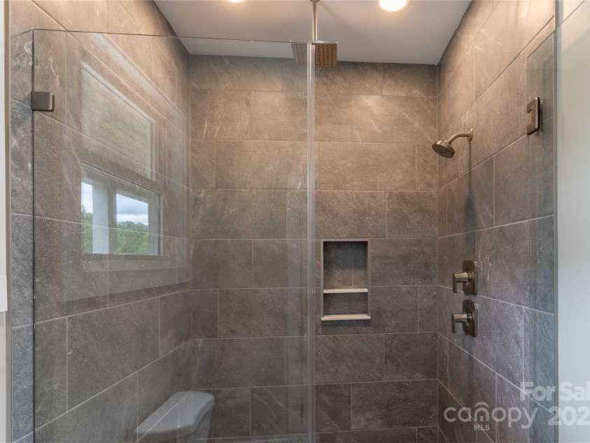 1711 Old Haywood Road, Asheville, NC 28806.  MLS# CAR4292392, YatesRealty ID 11813. Wonderful Shower with multiple shower heads
