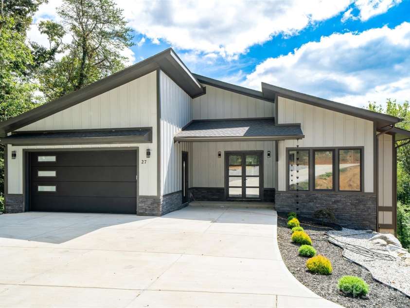 27 George Allen Ridge, Arden, NC 28704.  MLS# CAR4301850, YatesRealty ID 11818. Seller is offering a $10,000 buyer credit. These funds may be applied toward an interest rate buy-down, closing costs, or other buyer needs—providing exceptional flexibility and value.