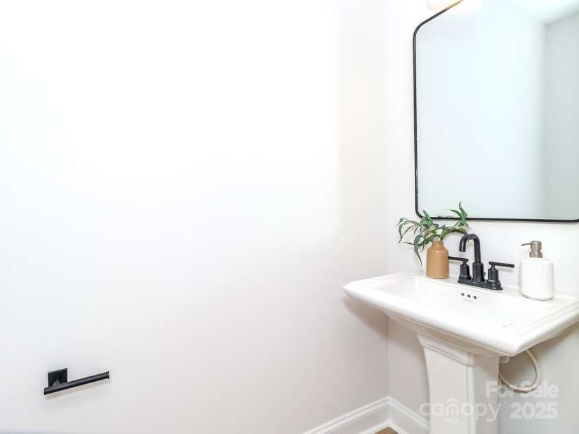 2505-2507 Elon Street, Charlotte, NC 28208.  MLS# CAR4246389, YatesRealty ID 11820. 2505 Elon half bathroom
