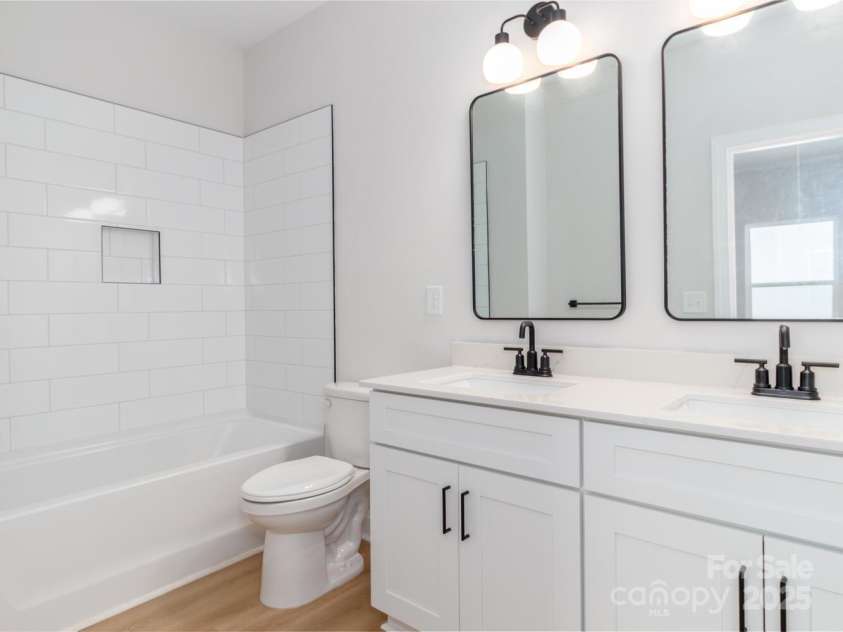 2505-2507 Elon Street, Charlotte, NC 28208.  MLS# CAR4246389, YatesRealty ID 11820. 2505 Elon secondary full bathroom