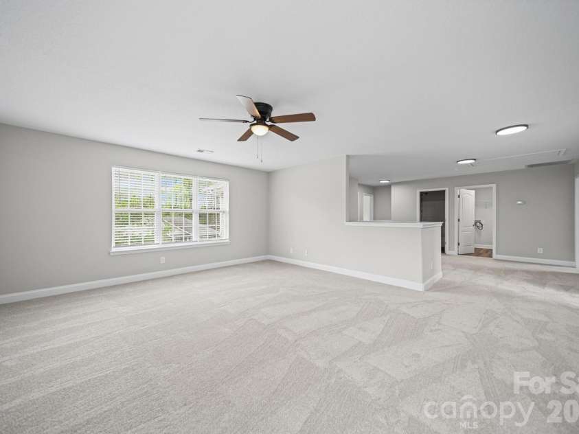 7219 Ogden Place, Denver, NC 28037.  MLS# CAR4367719, YatesRealty ID 11821. Flex area/living area second level
