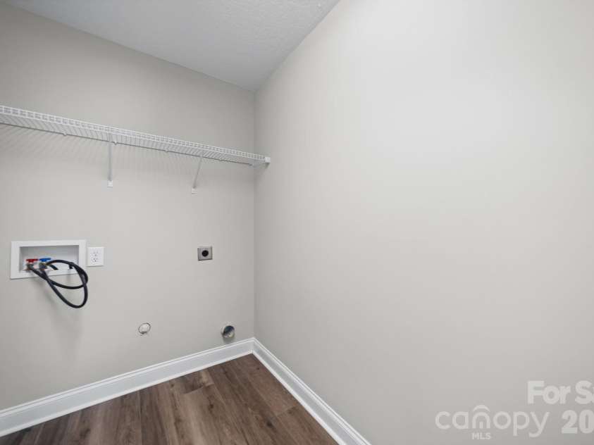 7219 Ogden Place, Denver, NC 28037.  MLS# CAR4367719, YatesRealty ID 11821. Laundry room second level