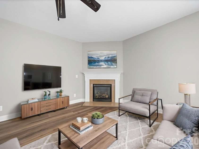 7219 Ogden Place, Denver, NC 28037.  MLS# CAR4367719, YatesRealty ID 11821. Main level, living room virtually staged