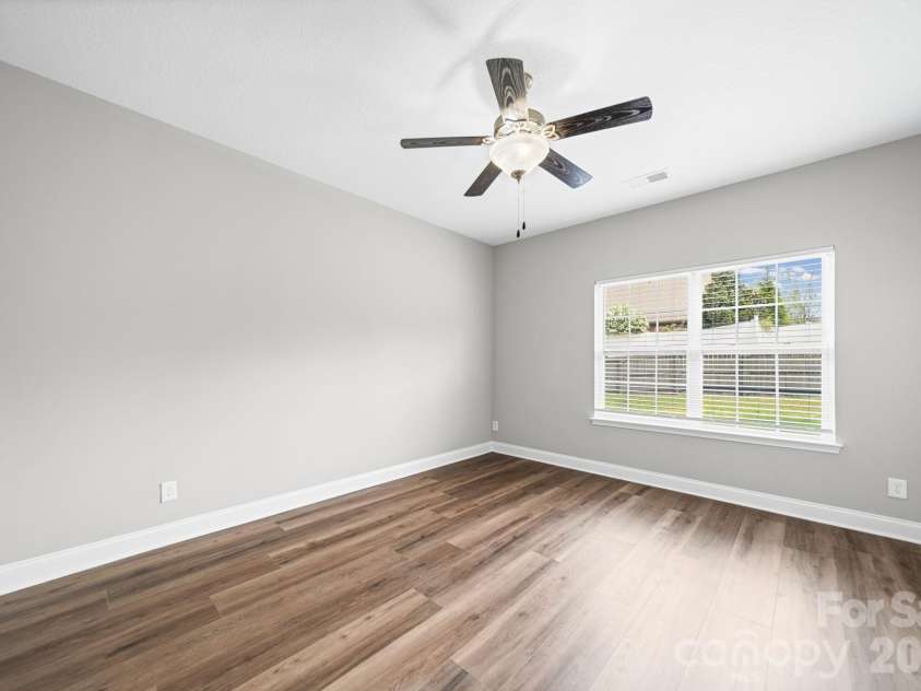7219 Ogden Place, Denver, NC 28037.  MLS# CAR4367719, YatesRealty ID 11821. Master bedroom, main level