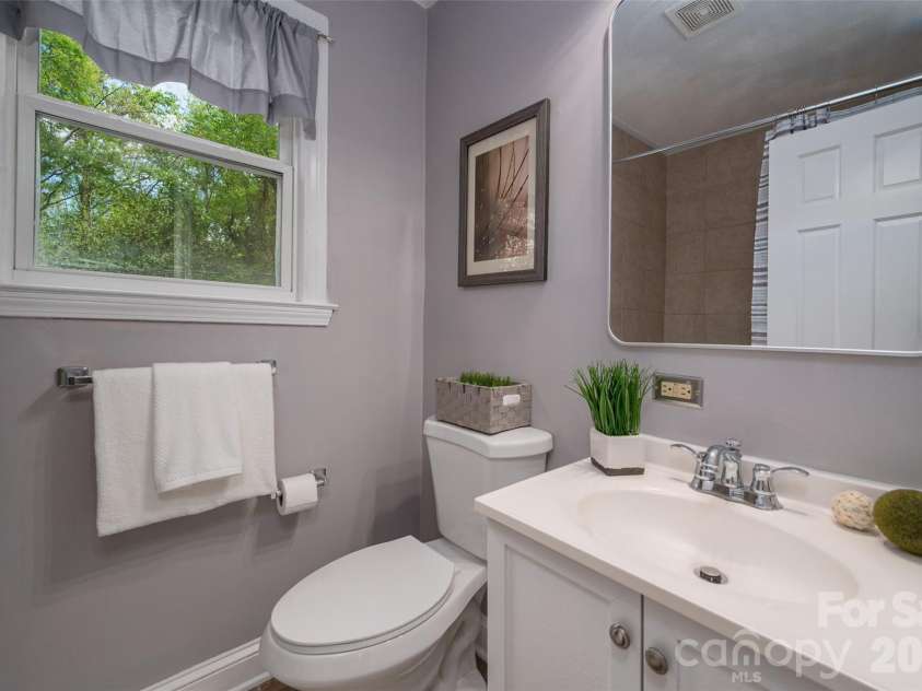 2516 Columbus Circle, Charlotte, NC 28208.  MLS# CAR4341027, YatesRealty ID 11822. Tiled shower/bath combo, new light fixture not pictured.