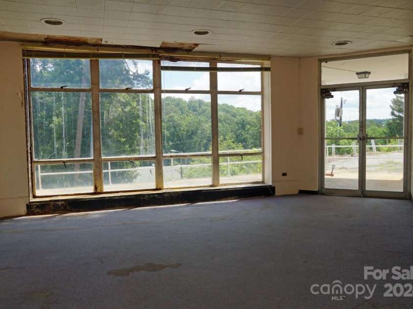 330 Carolina Drive, Tryon, NC 28782.  MLS# CAR4154073, YatesRealty ID 11822. 