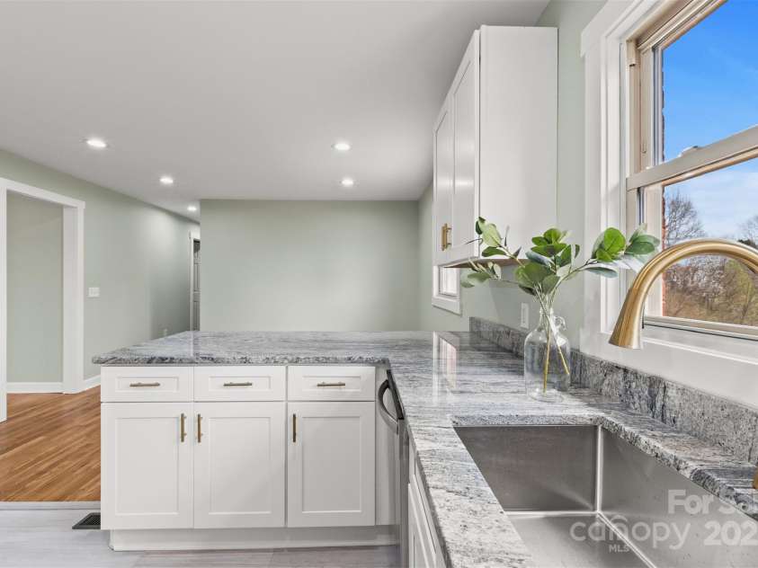 817 Dudley Shoals Road, Granite Falls, NC 28630.  MLS# CAR4234525, YatesRealty ID 11832. 