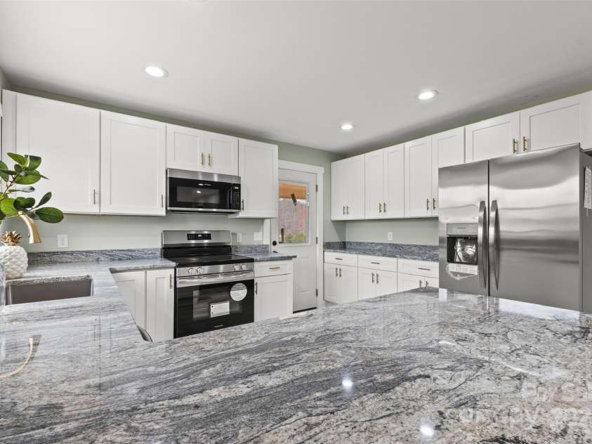 817 Dudley Shoals Road, Granite Falls, NC 28630.  MLS# CAR4234525, YatesRealty ID 11832. 