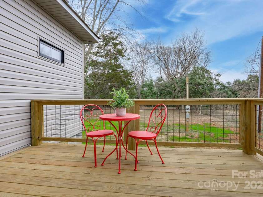 408 Hudson Street, Winnsboro, SC 29180.  MLS# CAR4223214, YatesRealty ID 11836. Private Porch off Primary Suite 1