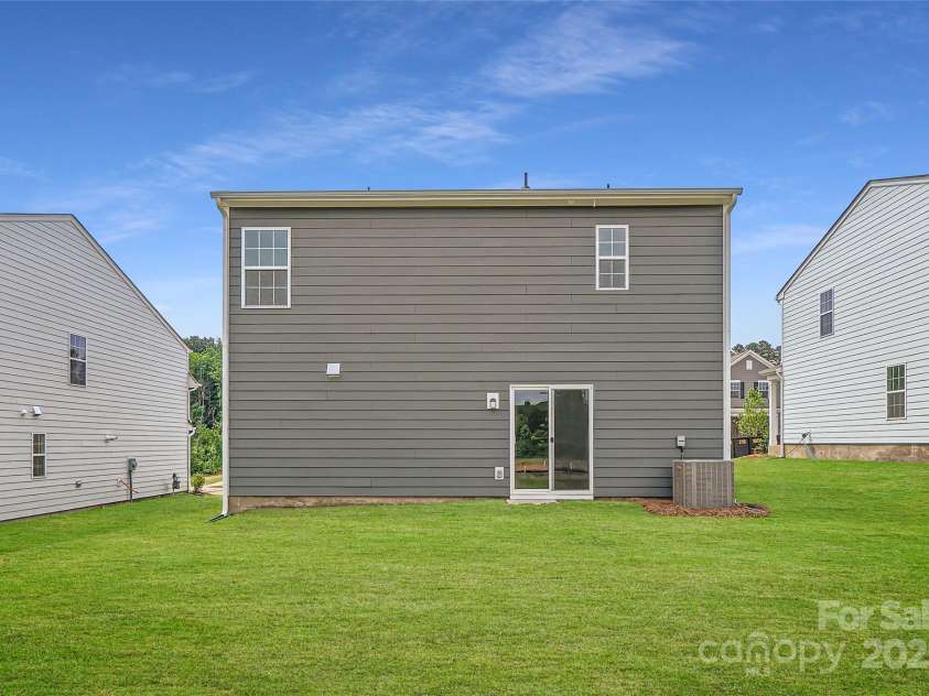 155 Astor Street, Troutman, NC 28166.  MLS# CAR4252687, YatesRealty ID 11842. Backyard