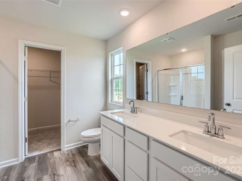 155 Astor Street, Troutman, NC 28166.  MLS# CAR4252687, YatesRealty ID 11842. Primary Bathroom
