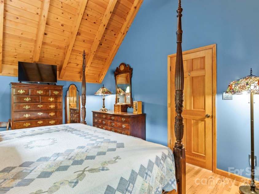 9289 Azalea Road, Sherrills Ford, NC 28673.  MLS# CAR4256638, YatesRealty ID 11847. Wood floors and a ceiling fan further accentuate this space